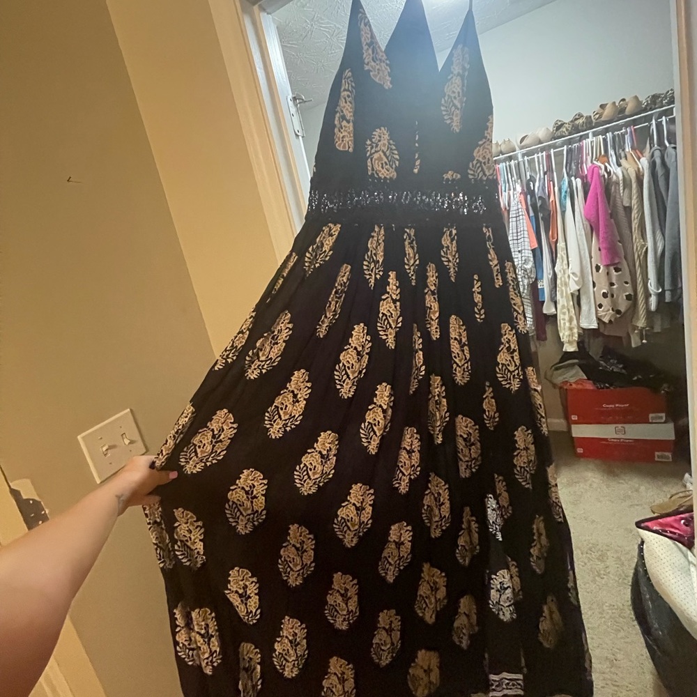 A navy and tan maxi dress